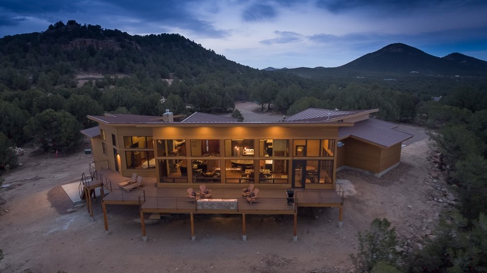 Mountain style home design photo in Denver