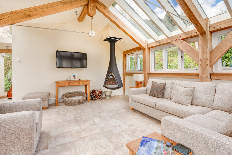 Design ideas for a medium sized rustic enclosed living room in Devon with white walls, ceramic flooring, a wood burning stove and a wall mounted tv.
