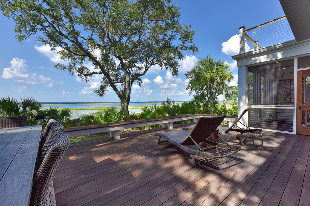 This is an example of a beach style backyard deck in Charleston.