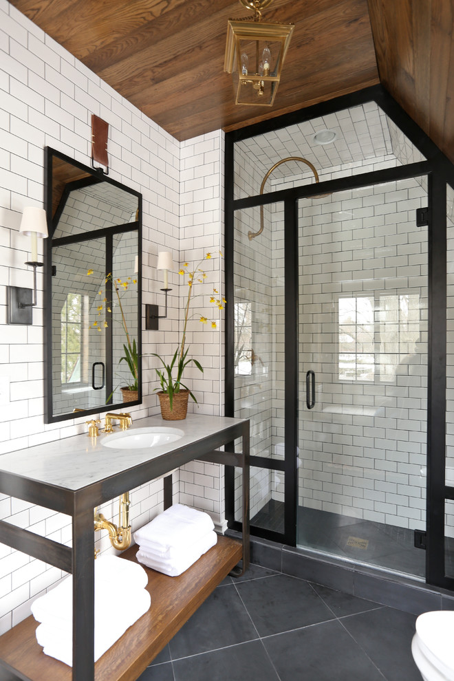 Photo of a transitional bathroom in Chicago with subway tile.