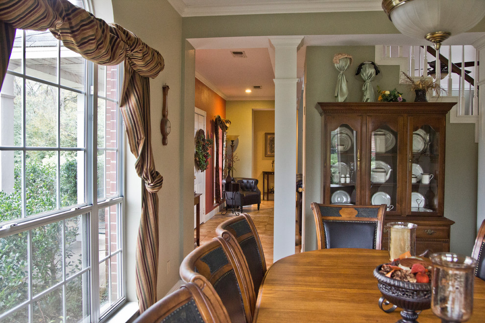 Example of a transitional dining room design in Austin