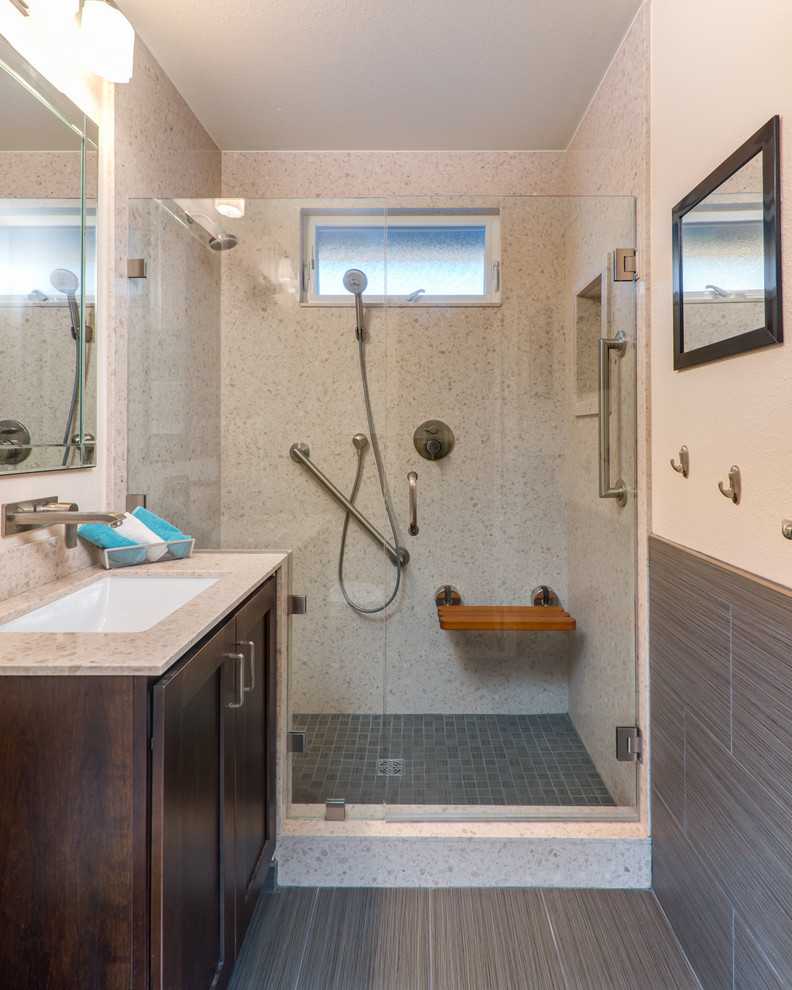 Mid-sized contemporary master bathroom in San Diego with raised-panel cabinets, dark wood cabinets, marble benchtops, an alcove shower, a one-piece toilet, gray tile and ceramic tile.