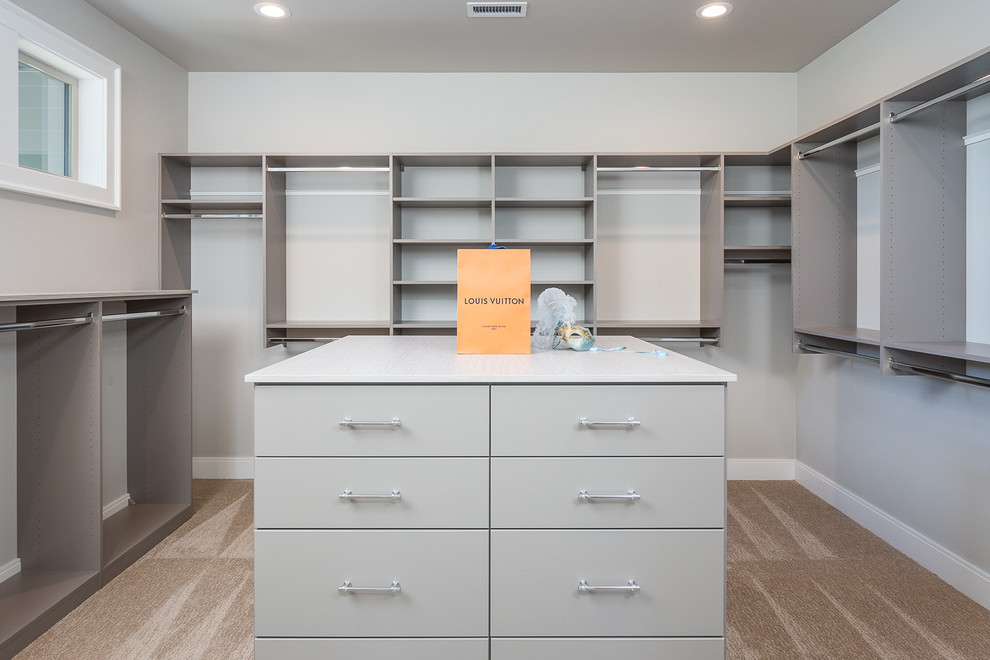 Inspiration for a transitional storage and wardrobe in Seattle with flat-panel cabinets and grey cabinets.