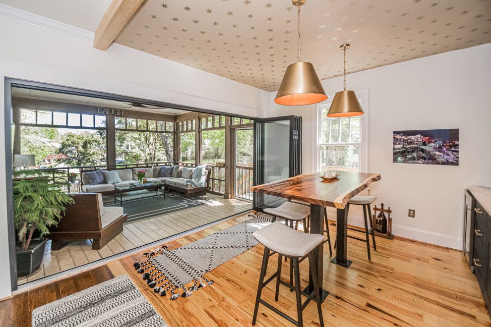 This is an example of a transitional sunroom in Other.