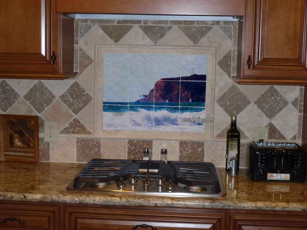 Elegant kitchen photo with stone tile backsplash