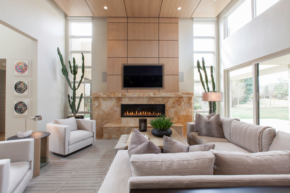 Large contemporary formal open concept living room in Denver with white walls, light hardwood floors, a ribbon fireplace, a stone fireplace surround, a built-in media wall and brown floor.