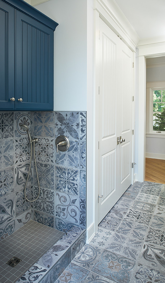Inspiration for a traditional galley dedicated laundry room in Grand Rapids with an undermount sink, beaded inset cabinets, blue cabinets, quartz benchtops, blue walls, ceramic floors, a side-by-side washer and dryer and multi-coloured floor.