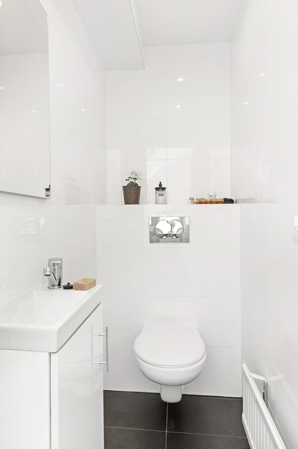 Homestyling av tomt nyrenoverat radhus scandinavian-powder-room