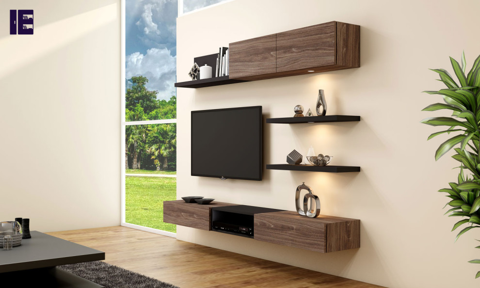 Photo of a large modern enclosed home cinema in London with a wall mounted tv and feature lighting.
