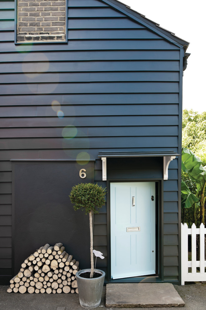 This is an example of a contemporary two-storey black exterior in Dorset.