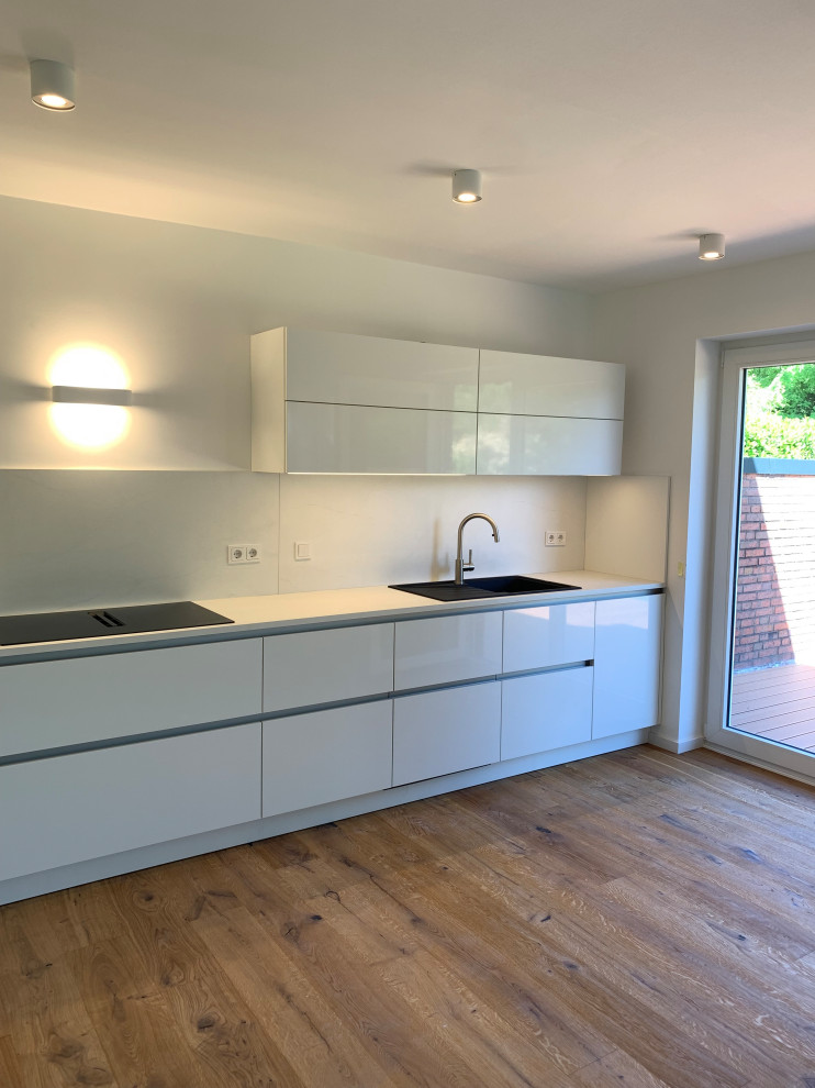 Modernisierung Einfamilienhaus mit Erweiterung der Gauben und  Fensteraufteilung