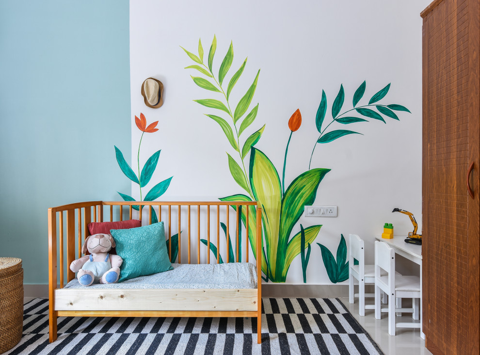 Contemporary nursery in Bengaluru with a feature wall.