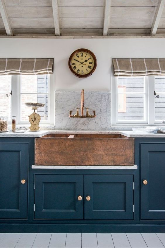 Photo of a mid-sized country single-wall eat-in kitchen in Columbus with a farmhouse sink, recessed-panel cabinets, blue cabinets, marble benchtops, white splashback, marble splashback, stainless steel appliances, painted wood floors, grey floor and white benchtop.