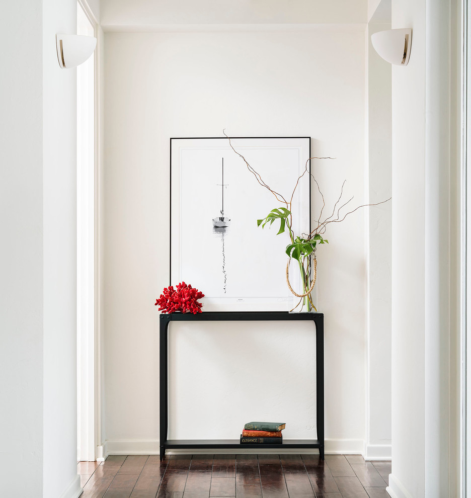 Inspiration for a transitional hallway in San Diego with white walls.