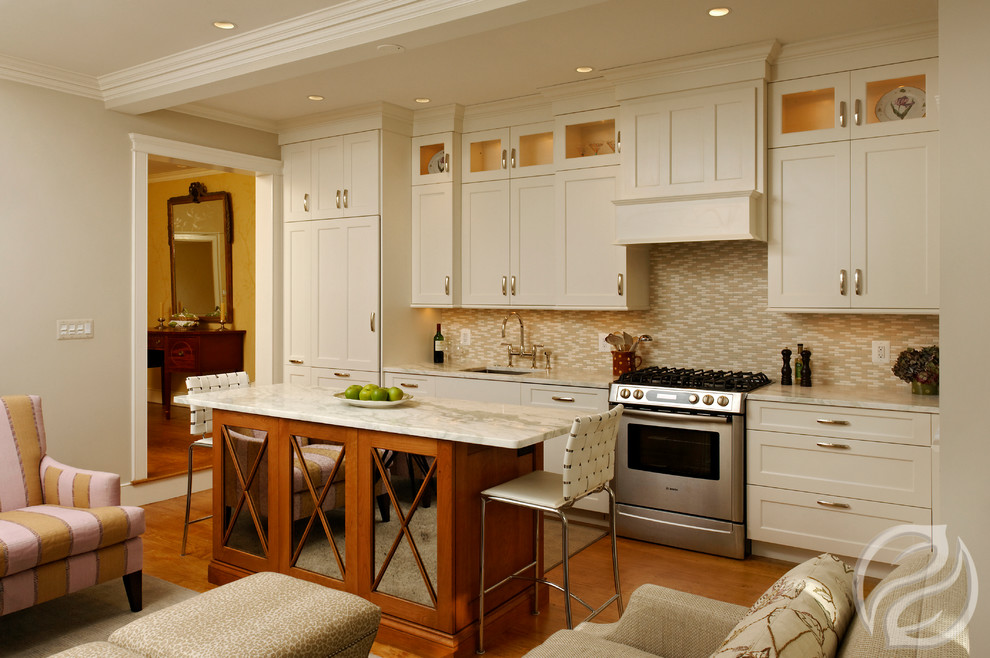 Example of a small transitional single-wall light wood floor eat-in kitchen design in Chicago with an undermount sink, recessed-panel cabinets, white cabinets, marble countertops, multicolored backsplash, stone tile backsplash, paneled appliances and an island