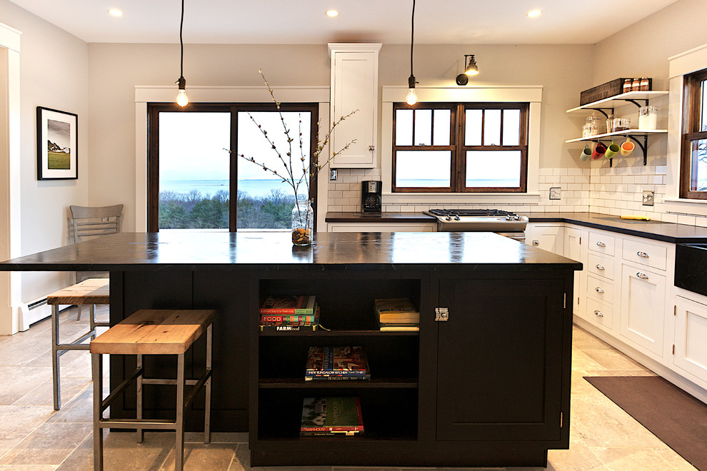 Photo of a contemporary kitchen in Other with subway tile splashback.