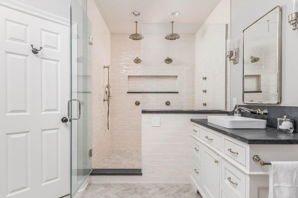 Photo of a country 3/4 bathroom in Indianapolis with beaded inset cabinets, white cabinets, a double shower, white tile, grey walls, a vessel sink, grey floor and a hinged shower door.