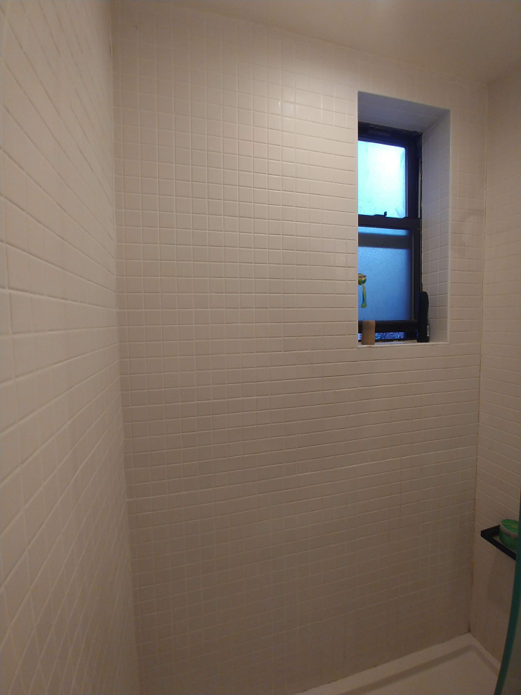 Grout cracking in bathroom corner walls on 7 month old bathroom