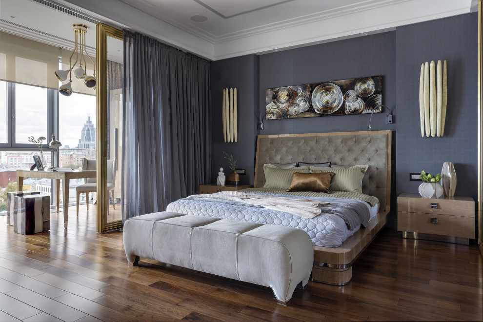 Expansive contemporary master bedroom in Moscow with grey walls, medium hardwood floors and brown floor.