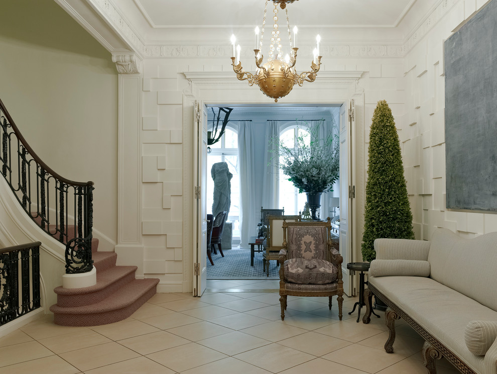 Inspiration for a large transitional foyer in New York with white walls, a double front door and a black front door.
