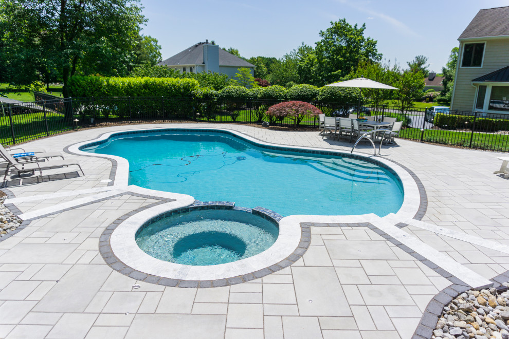 Holmdel, NJ: Paver Patio Installation Surrounding Inground Pool