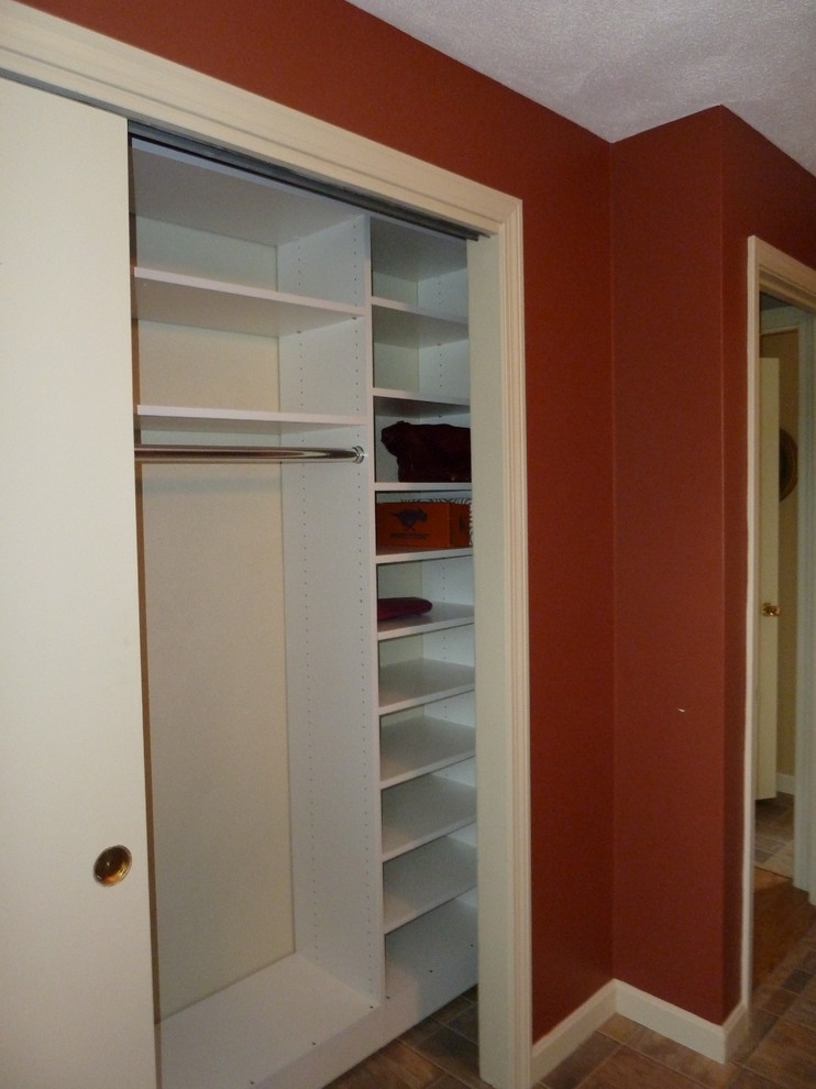 This is an example of a mid-sized traditional storage and wardrobe in Providence.