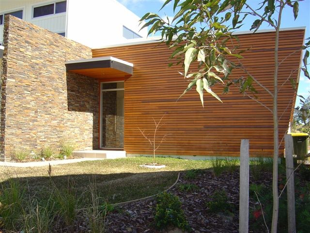 This is an example of a modern two-storey exterior in Sydney with stone veneer.