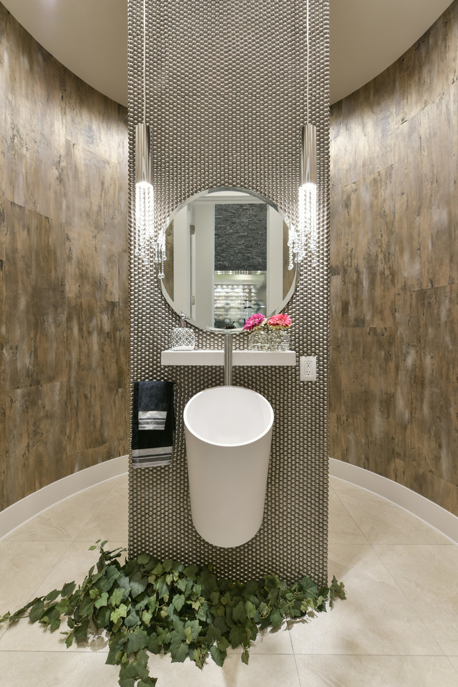 Design ideas for a mid-sized contemporary powder room in Edmonton with metal tile, a vessel sink, flat-panel cabinets, white cabinets, a two-piece toilet, gray tile, brown walls, porcelain floors, quartzite benchtops and beige floor.