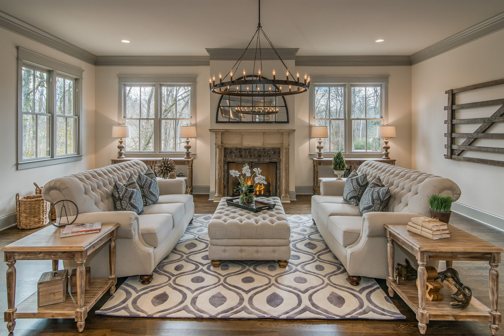 This is an example of a transitional living room in Nashville with white walls.