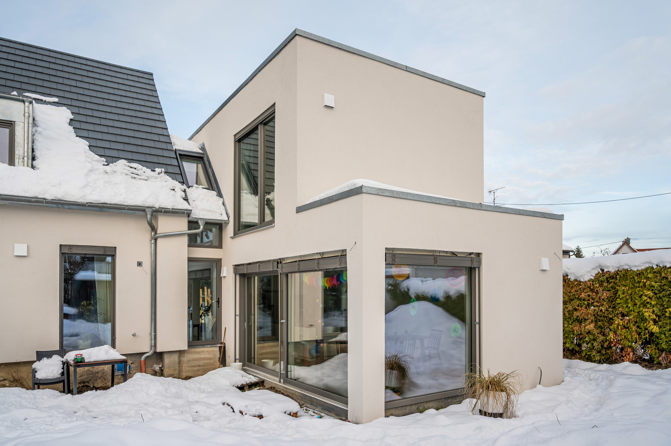 Siedlerhaus Umbau mit Neubau als Gebäudekomplex