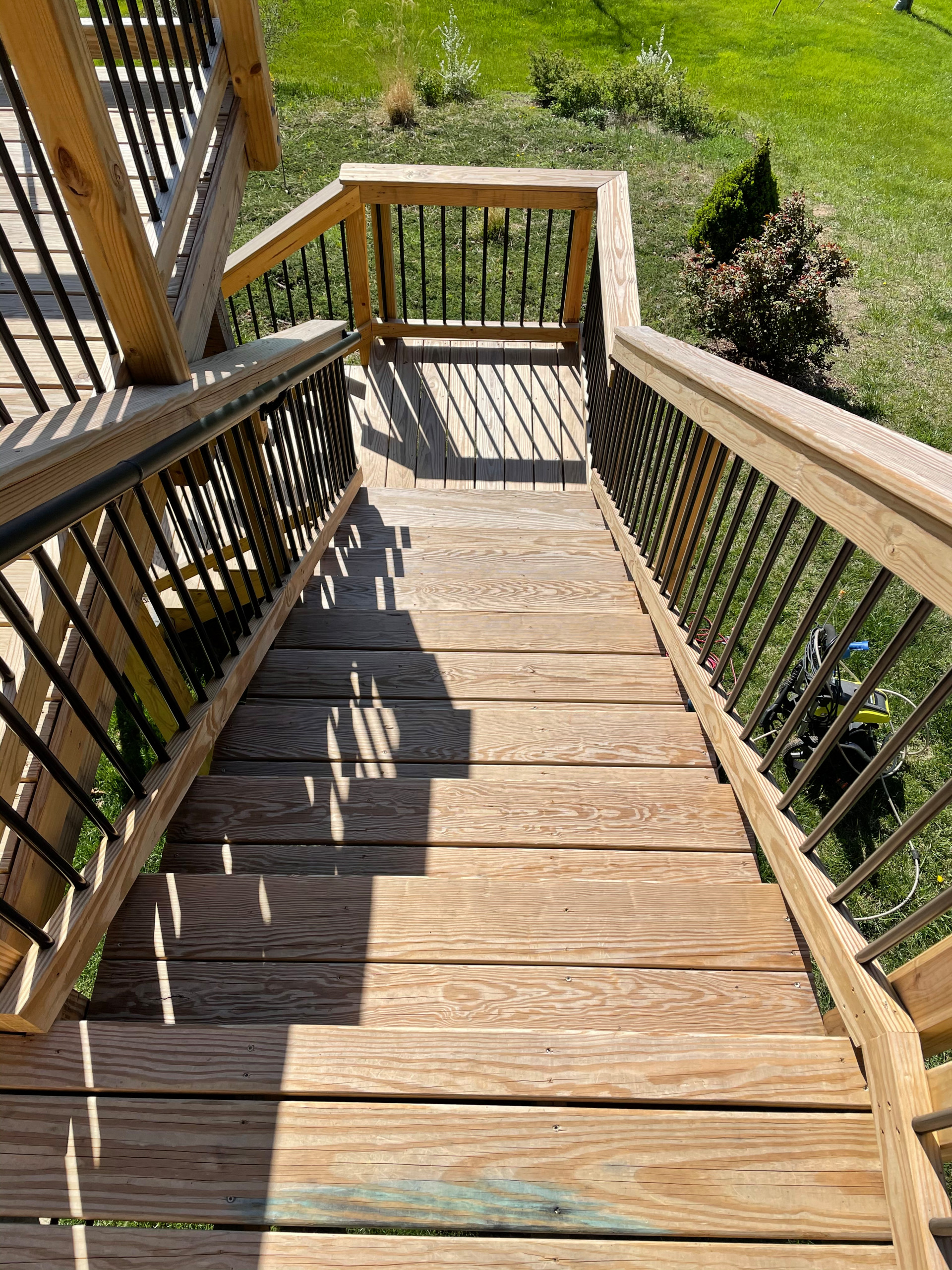 Deck stain and gutters power wash