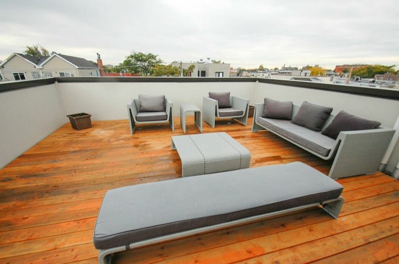 Mid-sized minimalist rooftop deck photo in Chicago with no cover