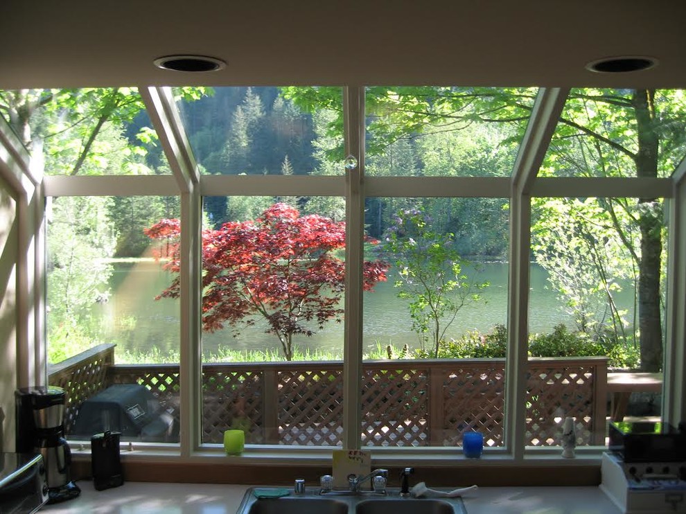 Mid-sized transitional single-wall enclosed kitchen photo in Seattle with a double-bowl sink and no island