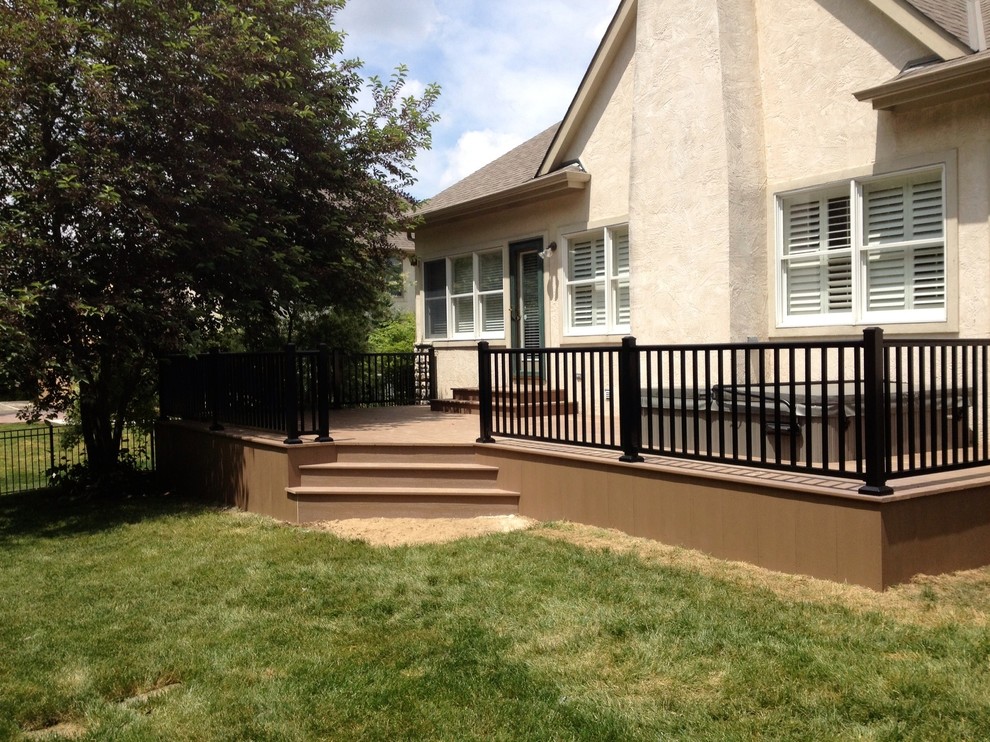 Inspiration for a mid-sized transitional side yard deck in Columbus with no cover.