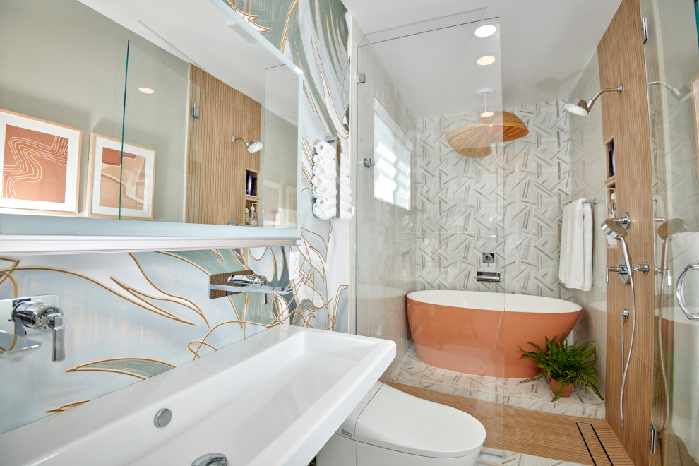 Example of a mid-sized island style master white tile and marble tile marble floor, white floor, double-sink, wallpaper ceiling and wall paneling bathroom design in Denver with white cabinets, a bidet, multicolored walls, a trough sink, a hinged shower door, white countertops, a niche and a floating vanity