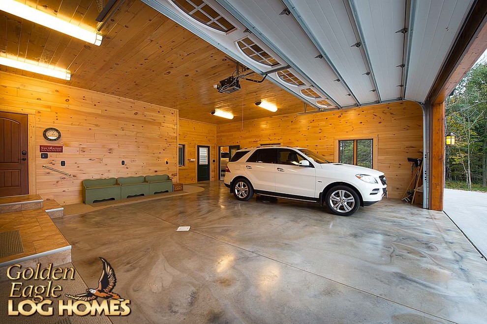 Large mountain style garage photo in Other