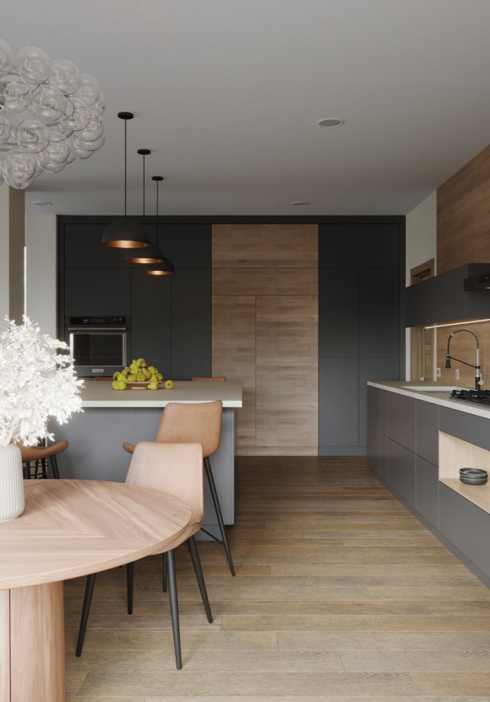 Inspiration for a mid-sized contemporary l-shaped open plan kitchen in Houston with a single-bowl sink, flat-panel cabinets, grey cabinets, quartz benchtops, beige splashback, timber splashback, black appliances, dark hardwood floors, with island, brown floor and beige benchtop.