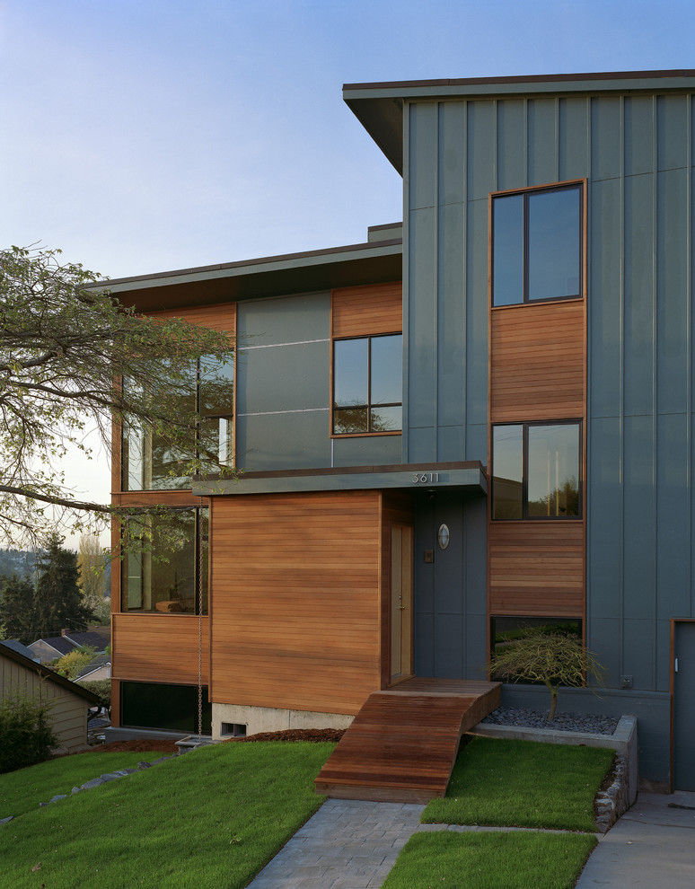 Contemporary exterior in Seattle with wood siding.