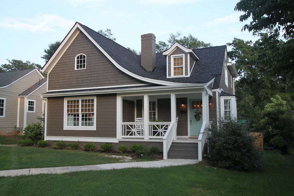 This is an example of an arts and crafts two-storey grey exterior in Other.