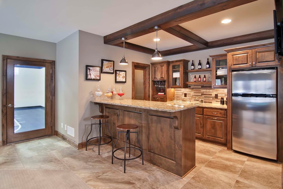 Photo of a mid-sized country seated home bar in Minneapolis with medium wood cabinets, granite benchtops and multi-coloured splashback.