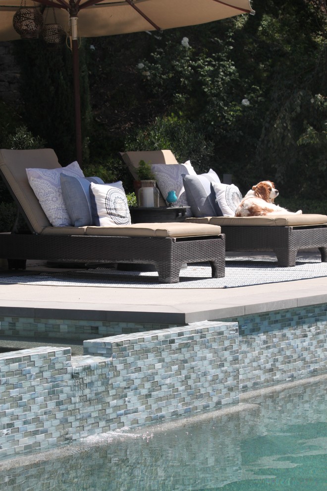 Hot tub - large transitional backyard concrete and rectangular hot tub idea in Los Angeles