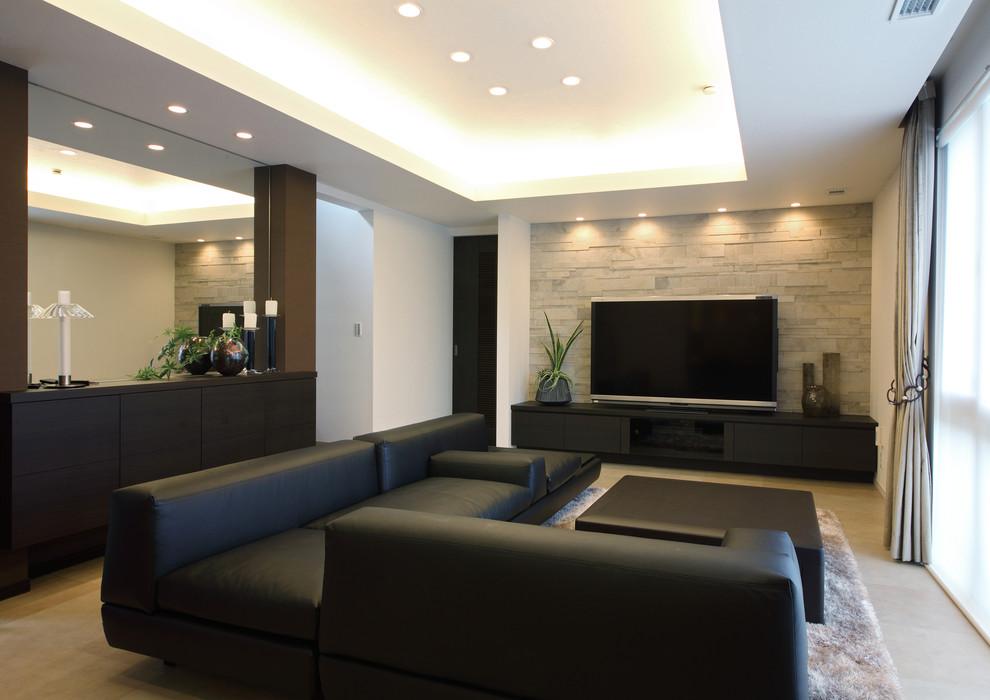 This is an example of a mid-sized modern formal open concept living room in Tokyo with white walls, vinyl floors, a freestanding tv and beige floor.