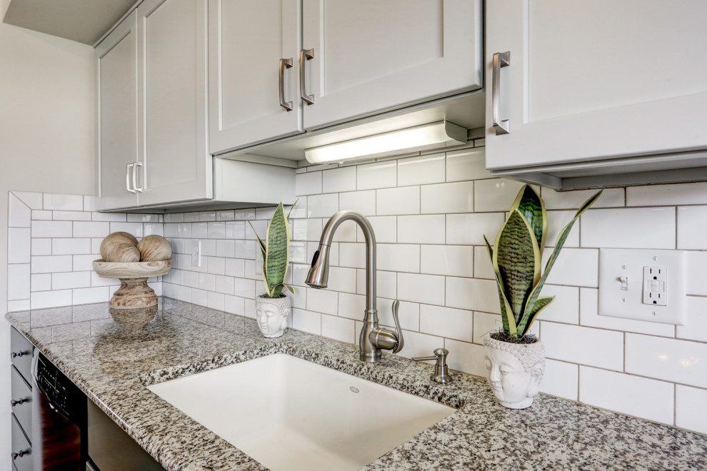 Inspiration for a mid-sized transitional l-shaped eat-in kitchen remodel with recessed-panel cabinets, green cabinets and a peninsula