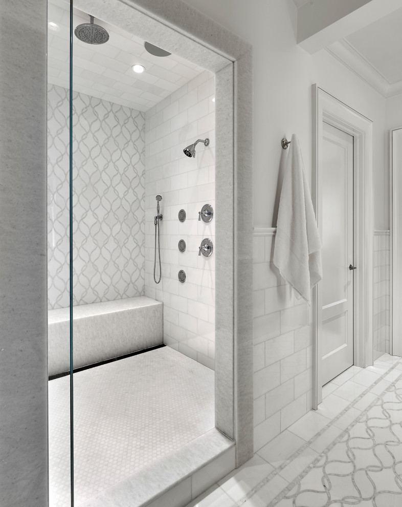 Inspiration for a mediterranean master white tile marble floor and white floor freestanding bathtub remodel in Chicago with white cabinets, white walls and a hinged shower door