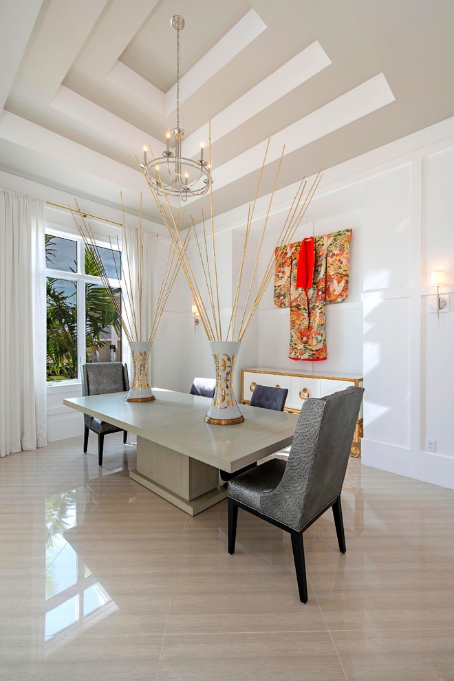 Design ideas for an asian dining room in Miami with white walls.