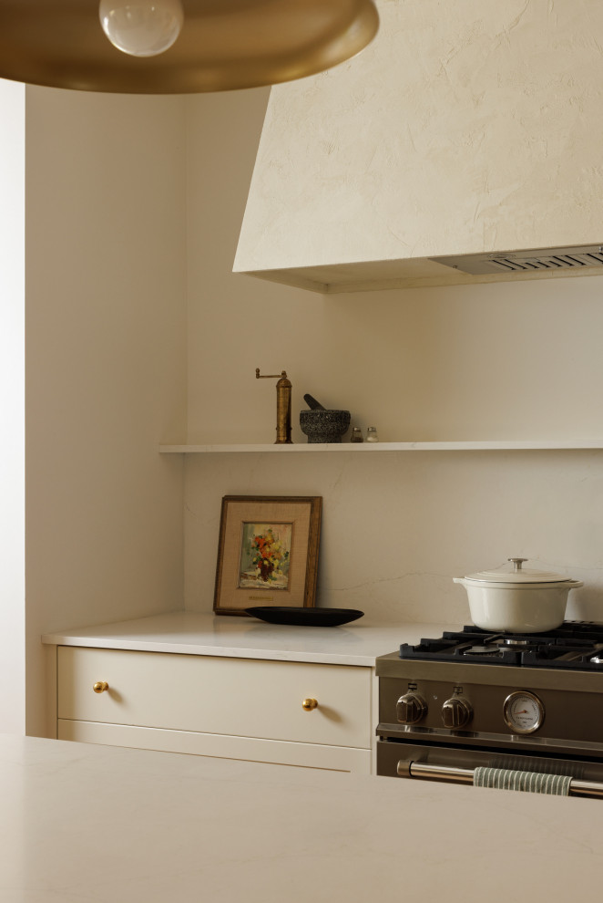 Example of a transitional kitchen design in Toronto