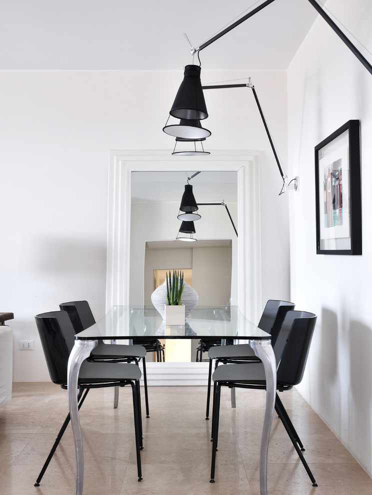Design ideas for a contemporary dining room in Rome with white walls and beige floor.