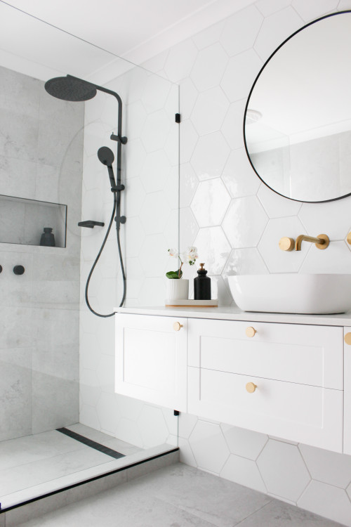 Cozy Elegance: Small Contemporary White Bathroom with Gold Fixtures