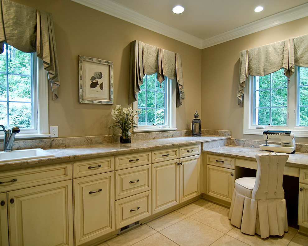 Transitional laundry room in Charlotte.
