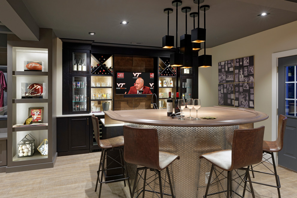 This is an example of a transitional galley seated home bar in DC Metro with recessed-panel cabinets, dark wood cabinets, brown splashback, beige floor and brown benchtop.